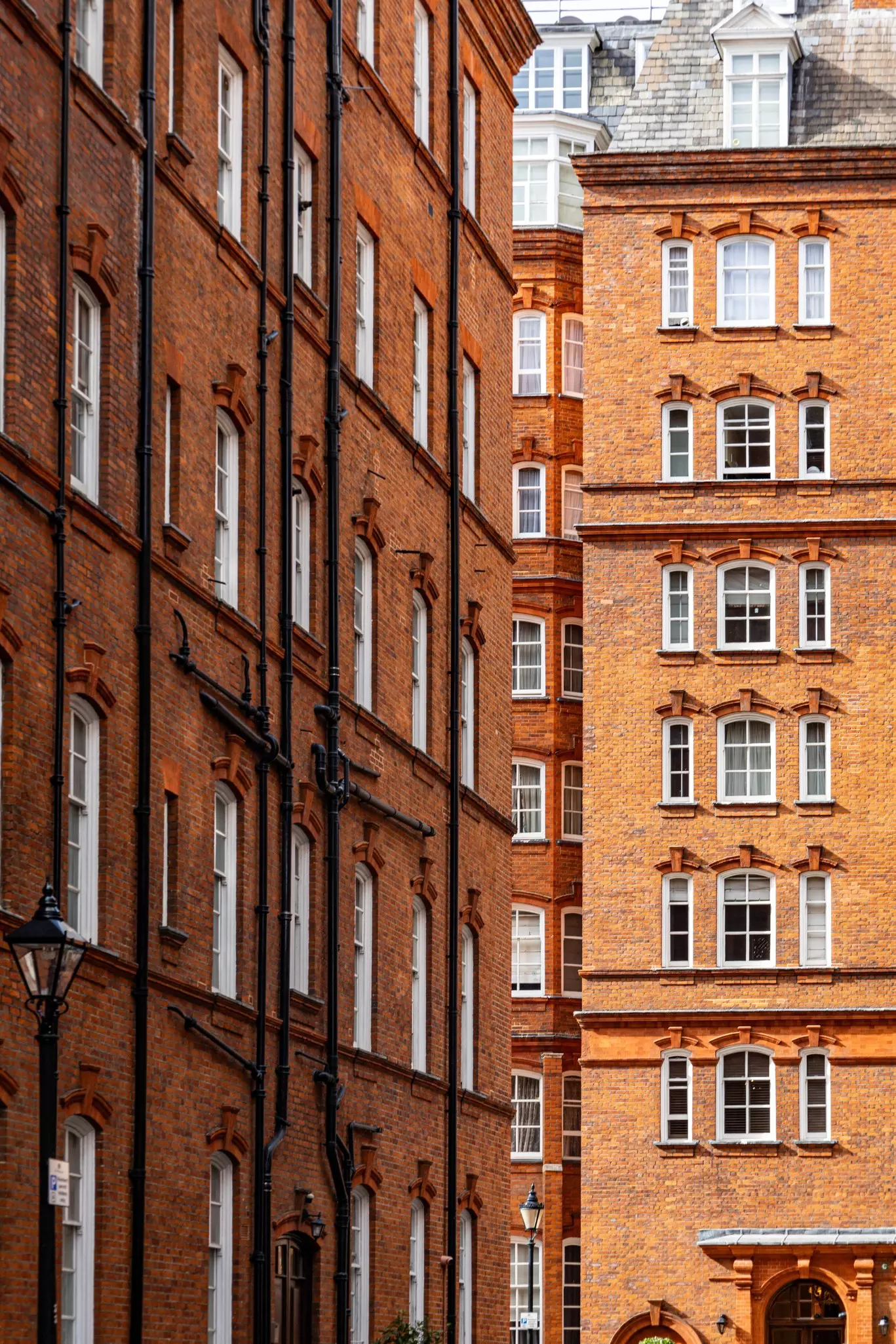 The brick ruins of an ornate Italianate villa overlooks trimmed hedges and flower gardens at this Adairsville agritourism destination