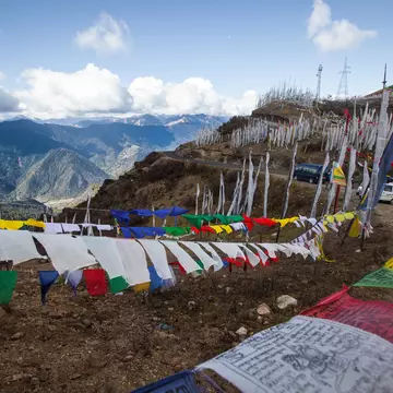 At the top of Cheli La, the views are gorgeous and the prayer flags many © Saud A Faisal / Getty Images