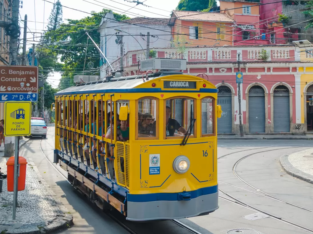 RIO DE JANEIRO Tourists ride the new version of the iconic bonde tram through the hillside neighborhood of Santa Teresa.