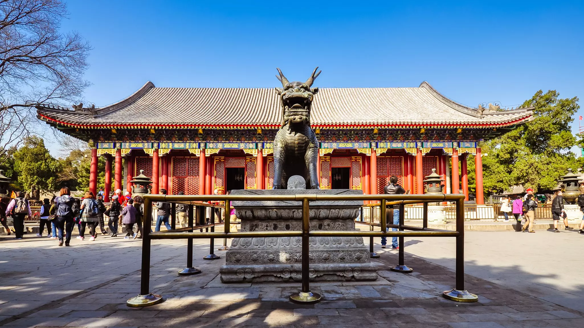 Tourists visit the Hall of Benevolence and Longevity at the Summer Palace, Beijing, China.