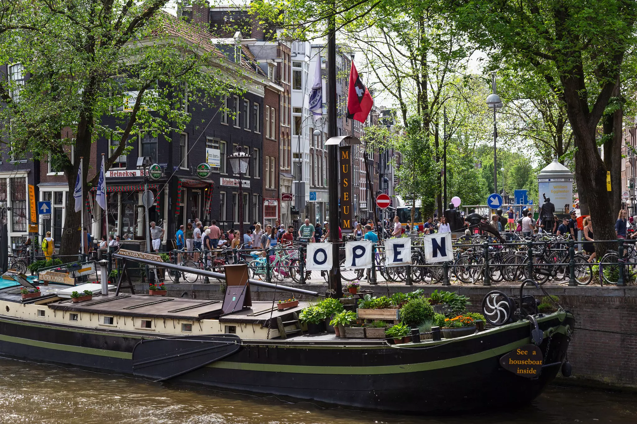 Amsterdam, The Netherlands on May 28, 2017; houseboat with plants on the prinsengracht in the center of the Jordaan.