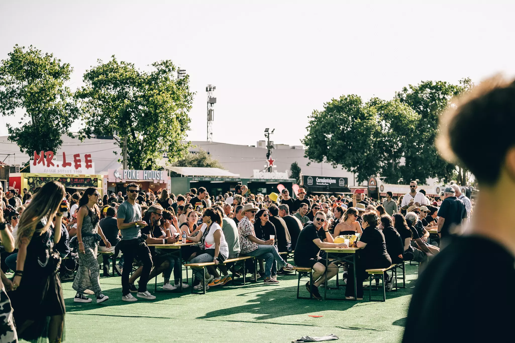 Food carts at NOS Alive festival and picnic tables at NOS Alive festival