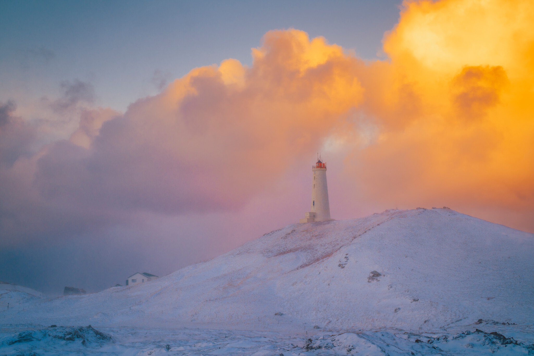 GettyImages-2281203843.jpg
Reykjanesviti lighthouse on a snowy hill at sunrise, Reykjanes Peninsula, Iceland