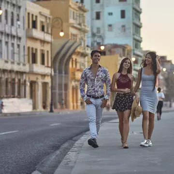 Getting to the heart of Havana's neighborhoods will take you past everything from faded 1950s glamor to late-night salsa sessions © xavierarnau / Getty Images