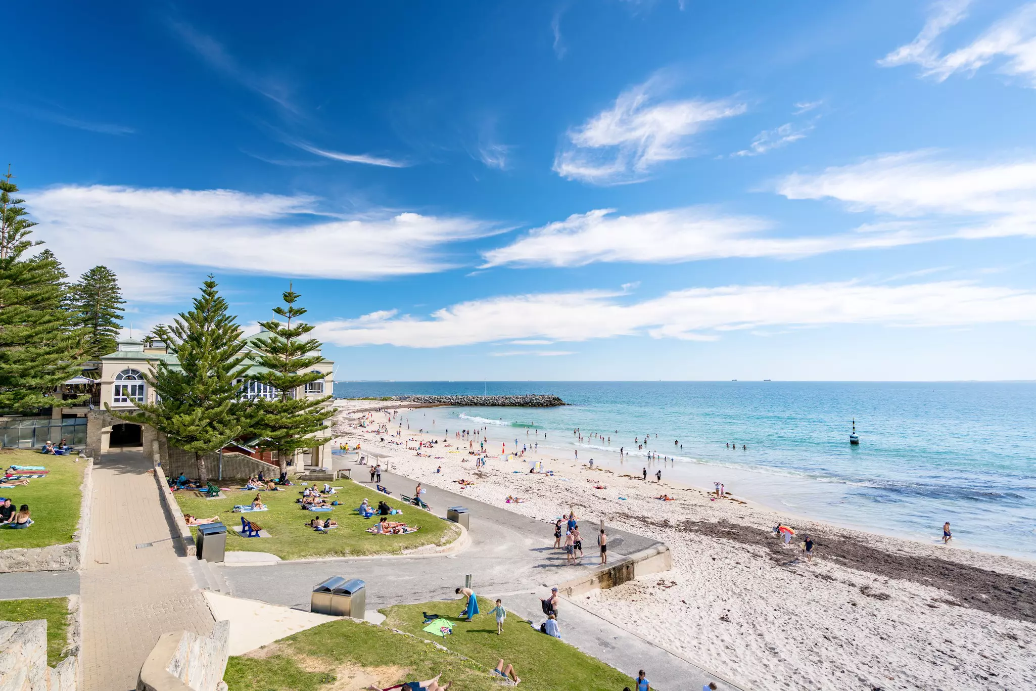 Cottesloe Beach on a warm Spring day with high cloud. Perth, Western Australia, Australia.