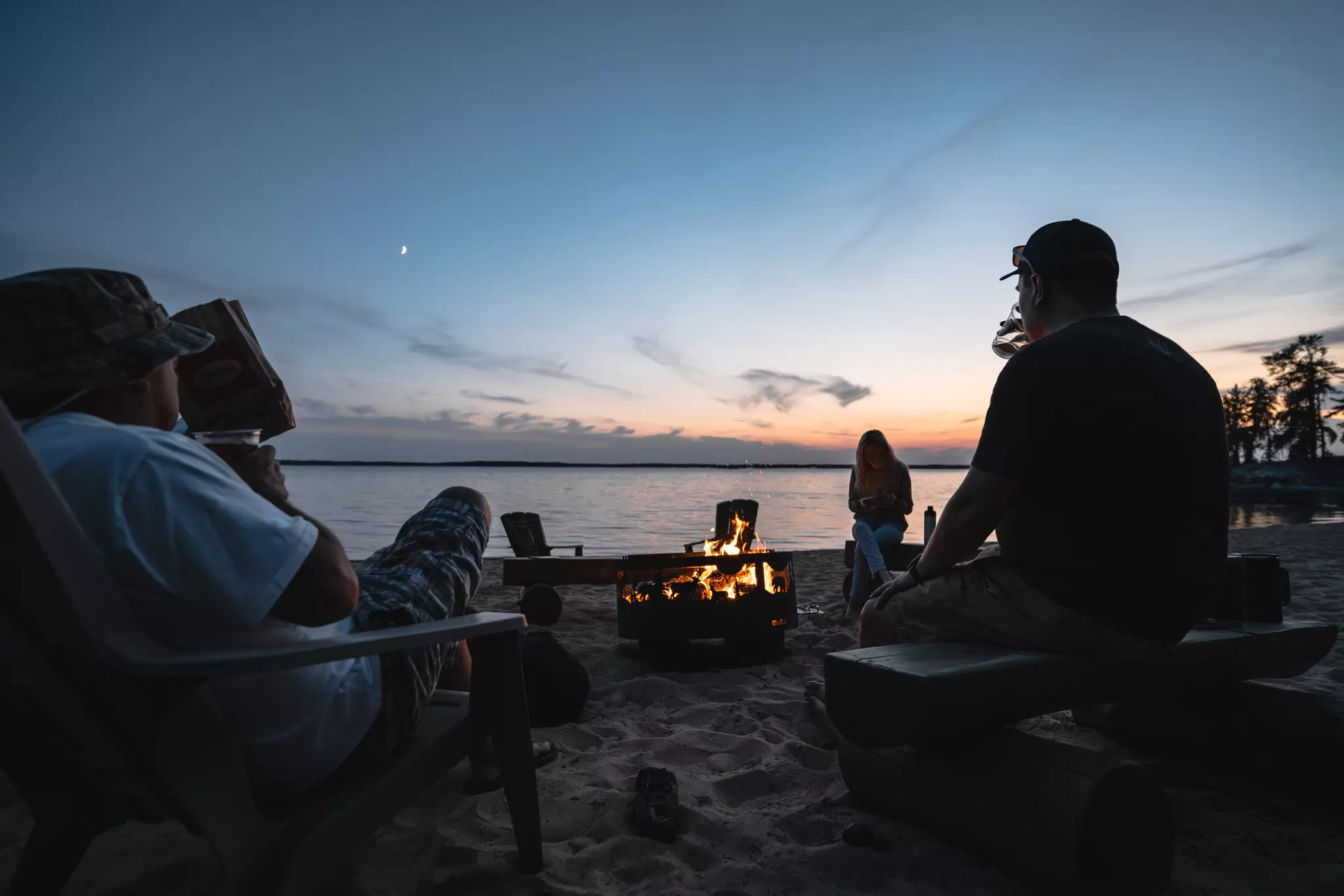 Aikens Lake Wilderness Lodge Summer Bonfire in Manitoba, Canada