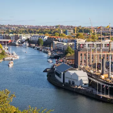 Bristol waterfront and cityscape in England, featuring Bristol Harbourside, Spike Island, Bristol Feeder Canal and Brunel's SS Great Britain. I Wei Huang/Shutterstock