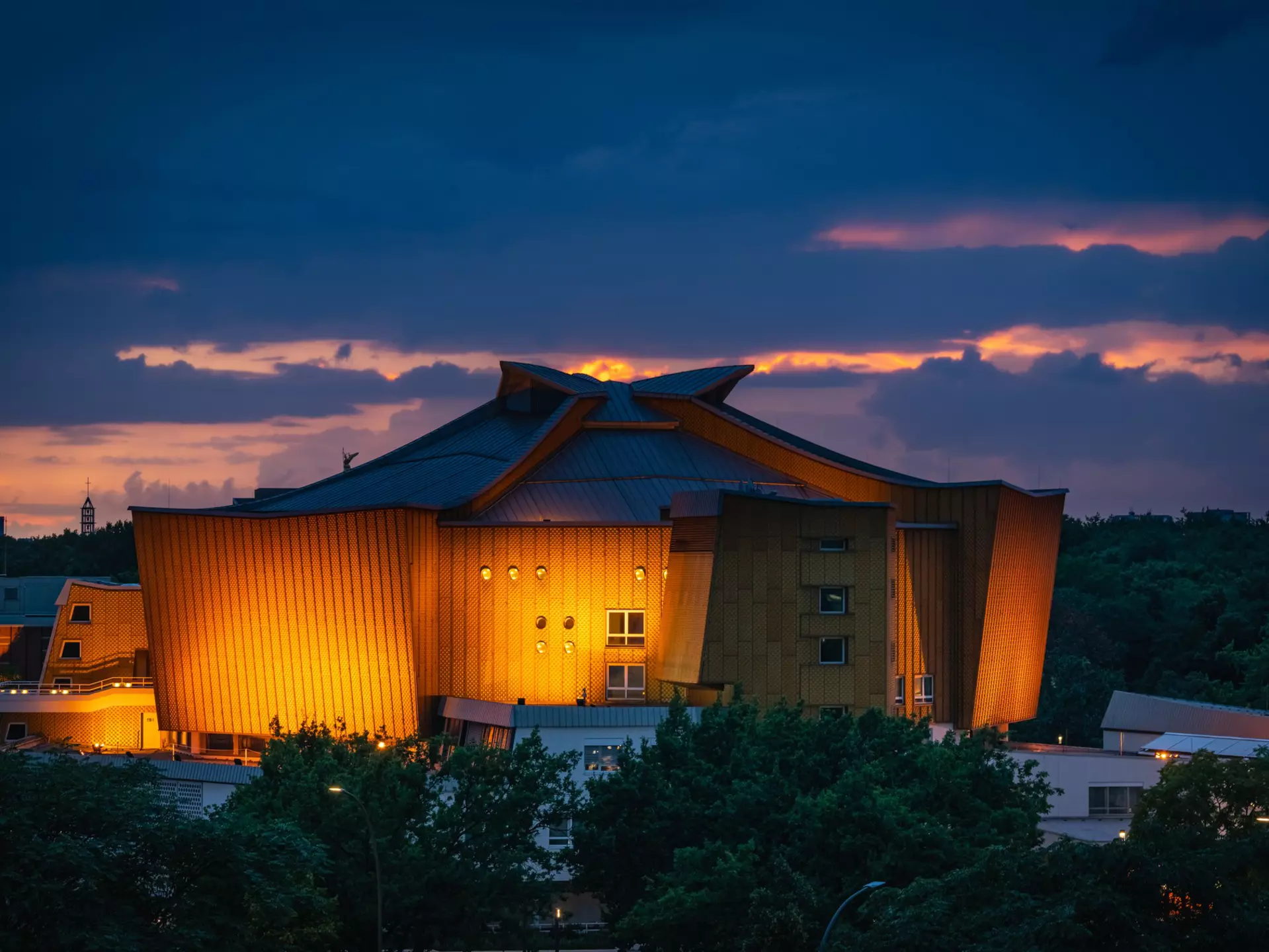 Berlin, Germany - August 07.2021: The Berliner Philharmonie concert hall at sunset. Building designed by German architect Hans Scharoun in 1961 is a masterpiece of modern architecture, License Type: media, Download Time: 2025-11-05T18:09:49.000Z, User: dorota_littlerobindesign, Editorial: true, purchase_order: 56530 - Guidebooks, job: Global Publishing WIP, client: Berlin 13, other: Dorota Michalec
