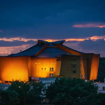 Berlin, Germany - August 07.2021: The Berliner Philharmonie concert hall at sunset. Building designed by German architect Hans Scharoun in 1961 is a masterpiece of modern architecture, License Type: media, Download Time: 2025-11-05T18:09:49.000Z, User: dorota_littlerobindesign, Editorial: true, purchase_order: 56530 - Guidebooks, job: Global Publishing WIP, client: Berlin 13, other: Dorota Michalec