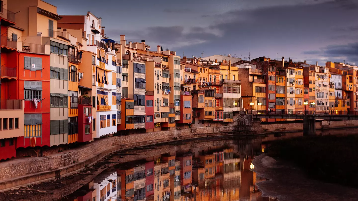 Residential buildings along canal, Girona, Catalunya, Spain.