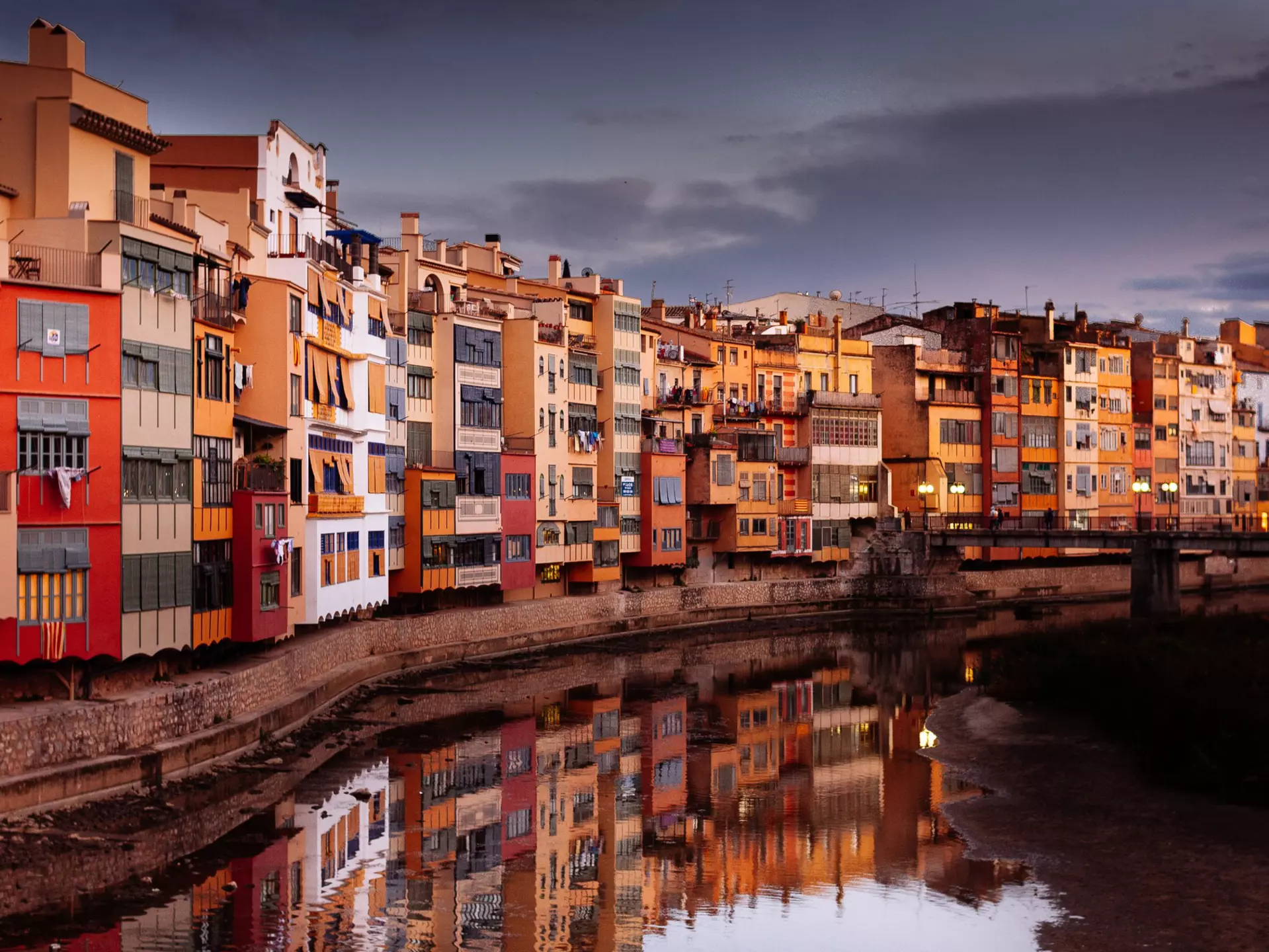 Residential buildings along canal, Girona, Catalunya, Spain.