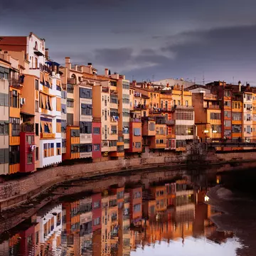 Residential buildings along canal, Girona, Catalunya, Spain.