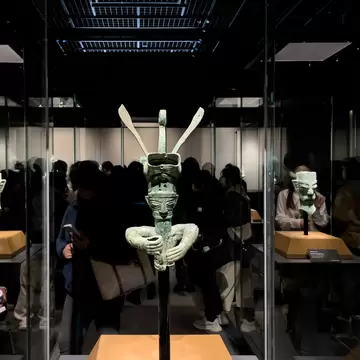 Shanghai, China - March 15th 2024: the mask and sculpture in Sanxingdui culture. it is is an archaeological site and a major Bronze Age culture in modern Guanghan, Sichuan. People are visiting, License Type: media, Download Time: 2026-08-26T14:46:47.000Z, User: LP_NZhan, Editorial: true, purchase_order: 65050 - Digital Destinations and Articles, job: App Content, client: Lonely Planet App, other: Nadine Zhan