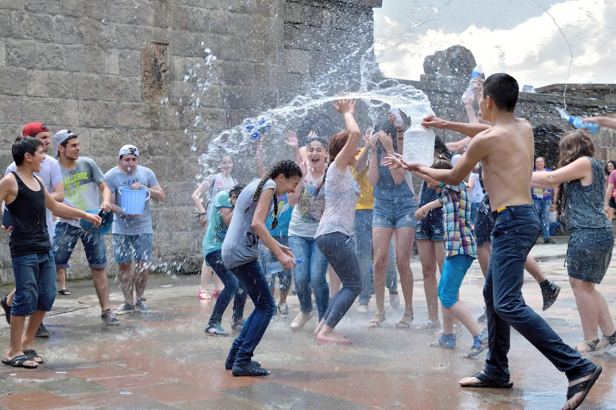 Vardavar celebration where people of social groups drench each other with water. Although now a Christian tradition, Vardavar's history dates back to pagan times