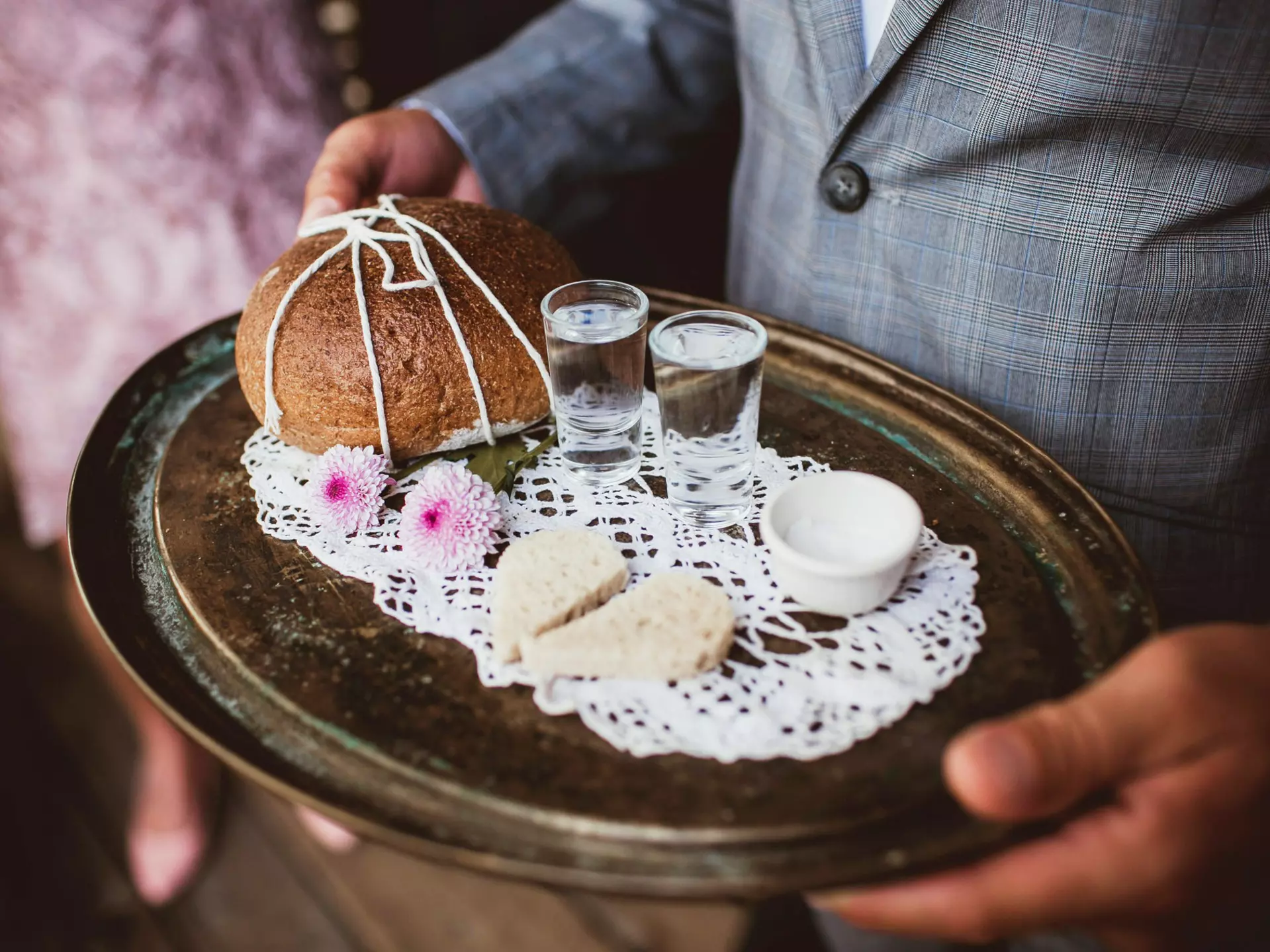 Wedding tradition in Poland and Russia. Parents welcome bride and groom with bread, vodka and salt. Decorative tray with food and alcohol. Empty copy space european culture background., License Type: media, Download Time: 2025-12-09T22:12:31.000Z, User: Norma.PrauseBrewer_LonelyPlanet, Editorial: false, purchase_order: 56530 - Guidebooks, job: Global Publishing WIP, client: Europe 5, other: Norma Brewer