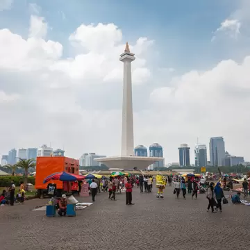 OCTOBER 19, 2014: People surround the National Monument in the centre of Merdeka Square.
303220931
skyscraper, jakarta, tower, square, park, national, travel, day, statue, central, urban, landmark, history, indonesia, asia, building, flame, obelisk, place, architecture, gold, city, independence, sky, tourism, java, monument, asian, museum, capital, cityscape, nasional, monas, monumen, merdeka, batavia