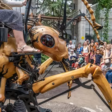 The Machine Gallery of the Machines of the Isle of Nantes with a crowd surrounding. Loire Valley, France.
