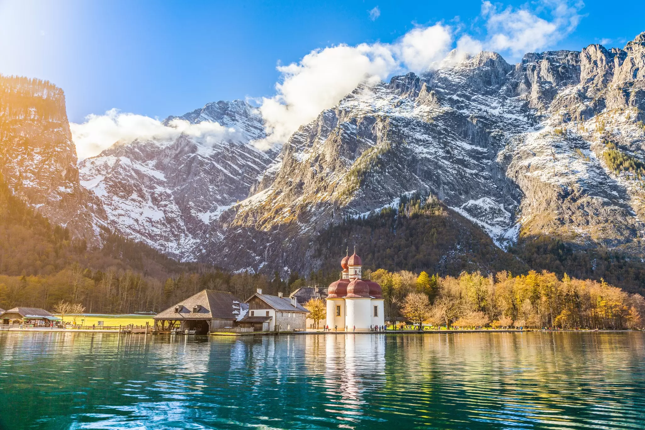Head to spots like Lake Konigssee in the fall for fewer visitors and colorful vistas © canadastock / Shutterstock
