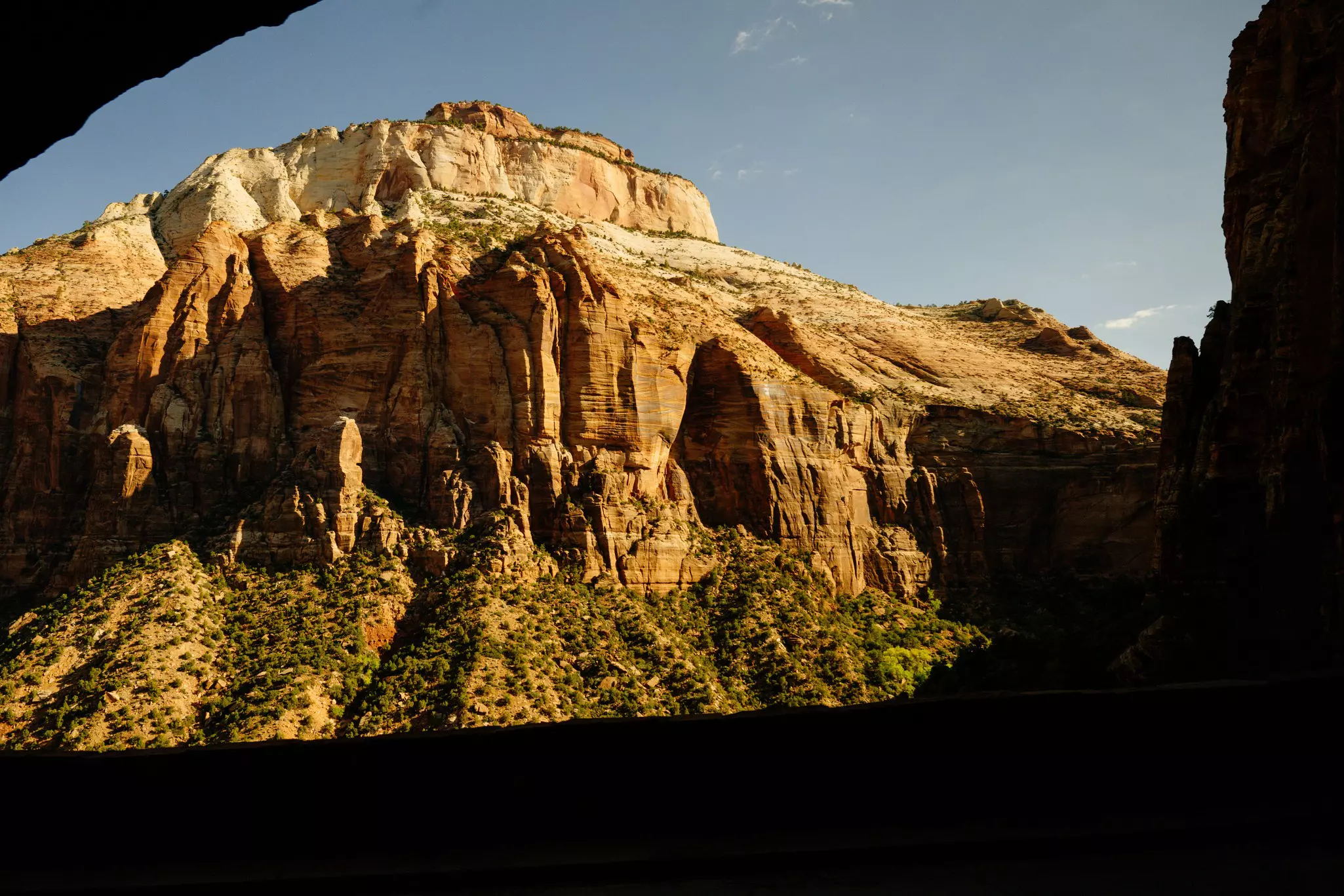 A view through a rocky tunnel at Zion National Park, Utah. 