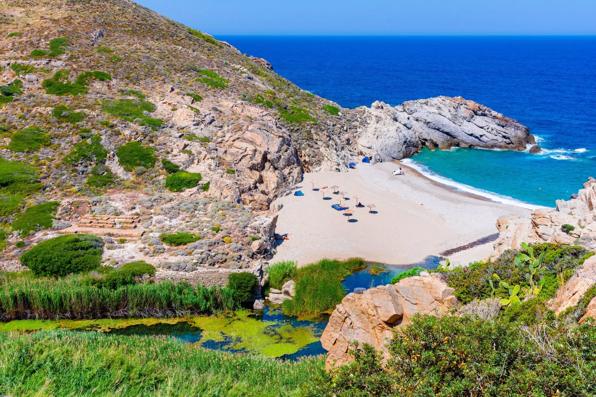 View from the hills above the sandy beach of Nas. 