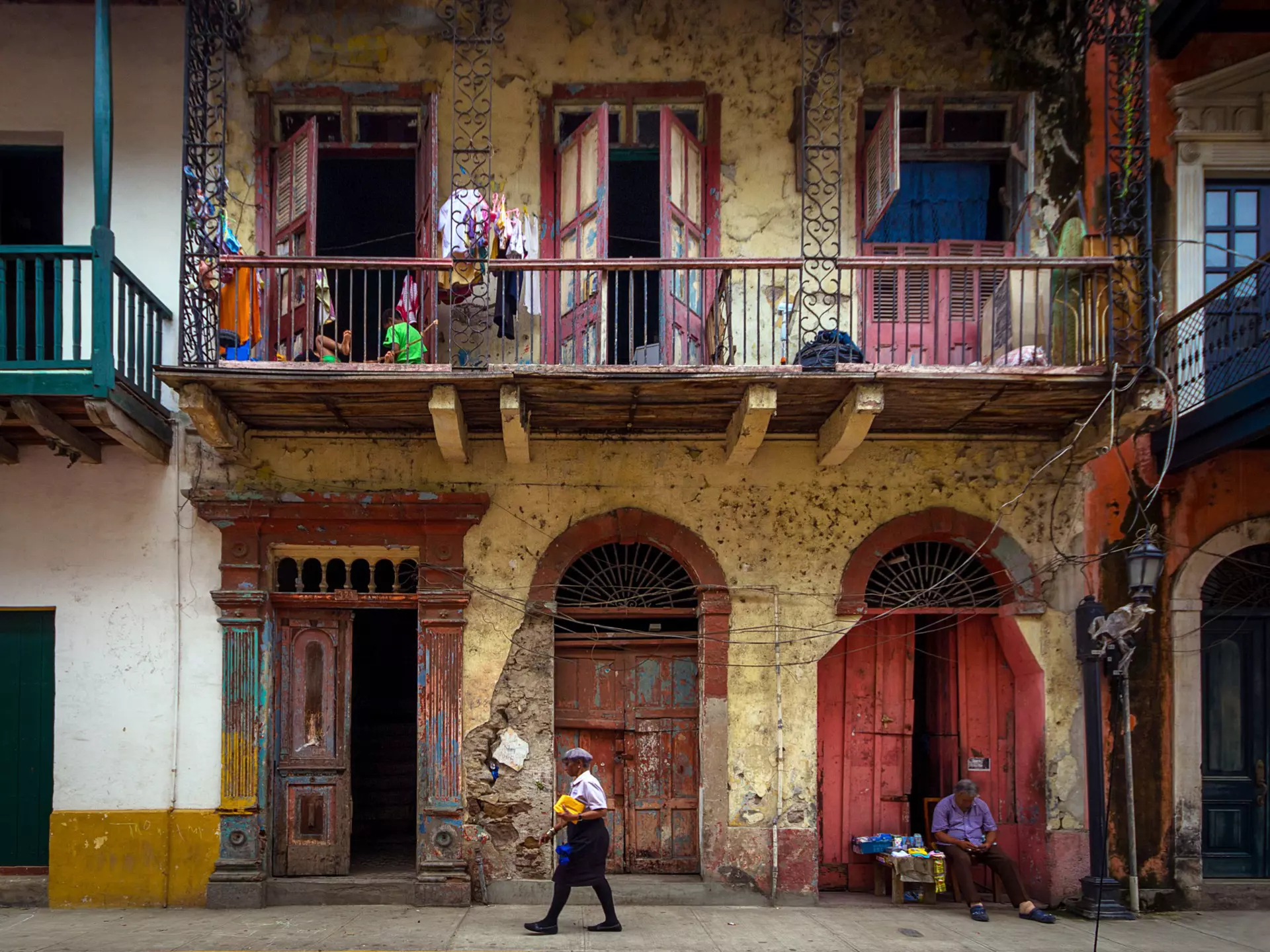 Panama City, Panama - September 12, 2013: Woman walking the streets and a vendor sleeping, in historic Casco Viejo district of Panama City, Panama.
538165896
City Street, Adult, People, Outdoors, Street, Women, Walking, Built Structure, Casco Viejo, Men, Photography, Latin American and Hispanic Ethnicity, Central America, Capital Cities, Travel Destinations, Horizontal, City, Sidewalk