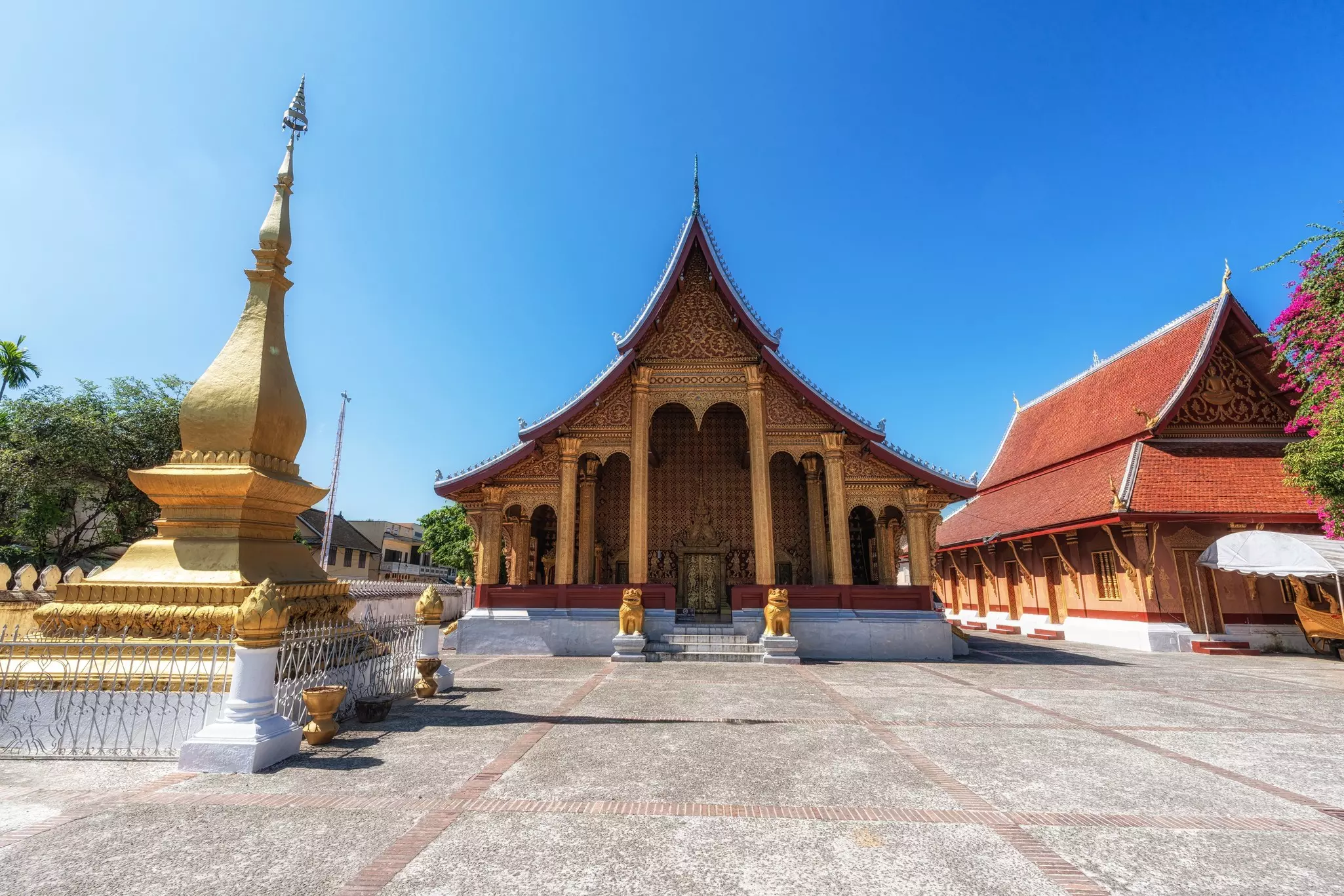 A pointed temple with golden decoration.