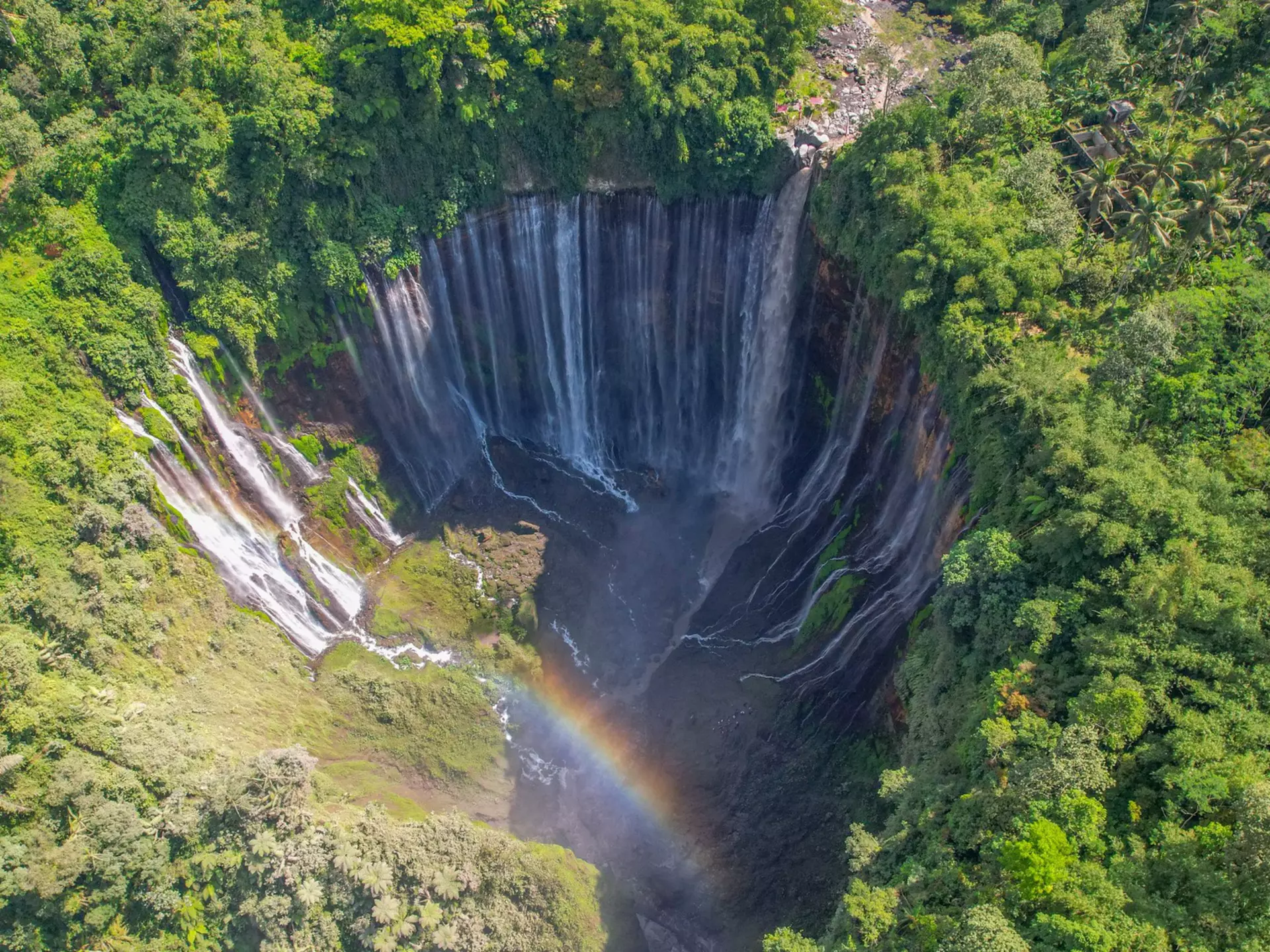 Gushing Tumpak Sewu is one of Indonesia's most dramatic waterfalls. Alenik Eremeeva/Shutterstock