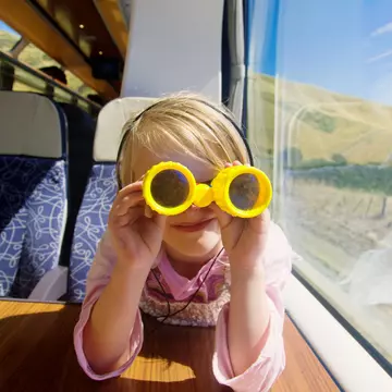 Train travel can be an conscious way to satisfy your wanderlust. Bonita Cooke / Getty Images
