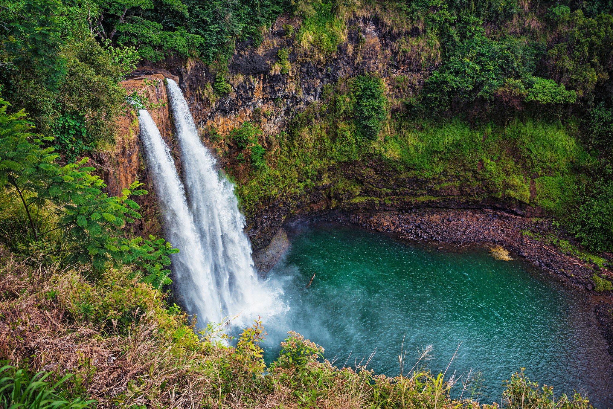 The majestic Wailua Falls on the island of Kauai. Wailua means 'two waters.'; Shutterstock ID 1382553263;