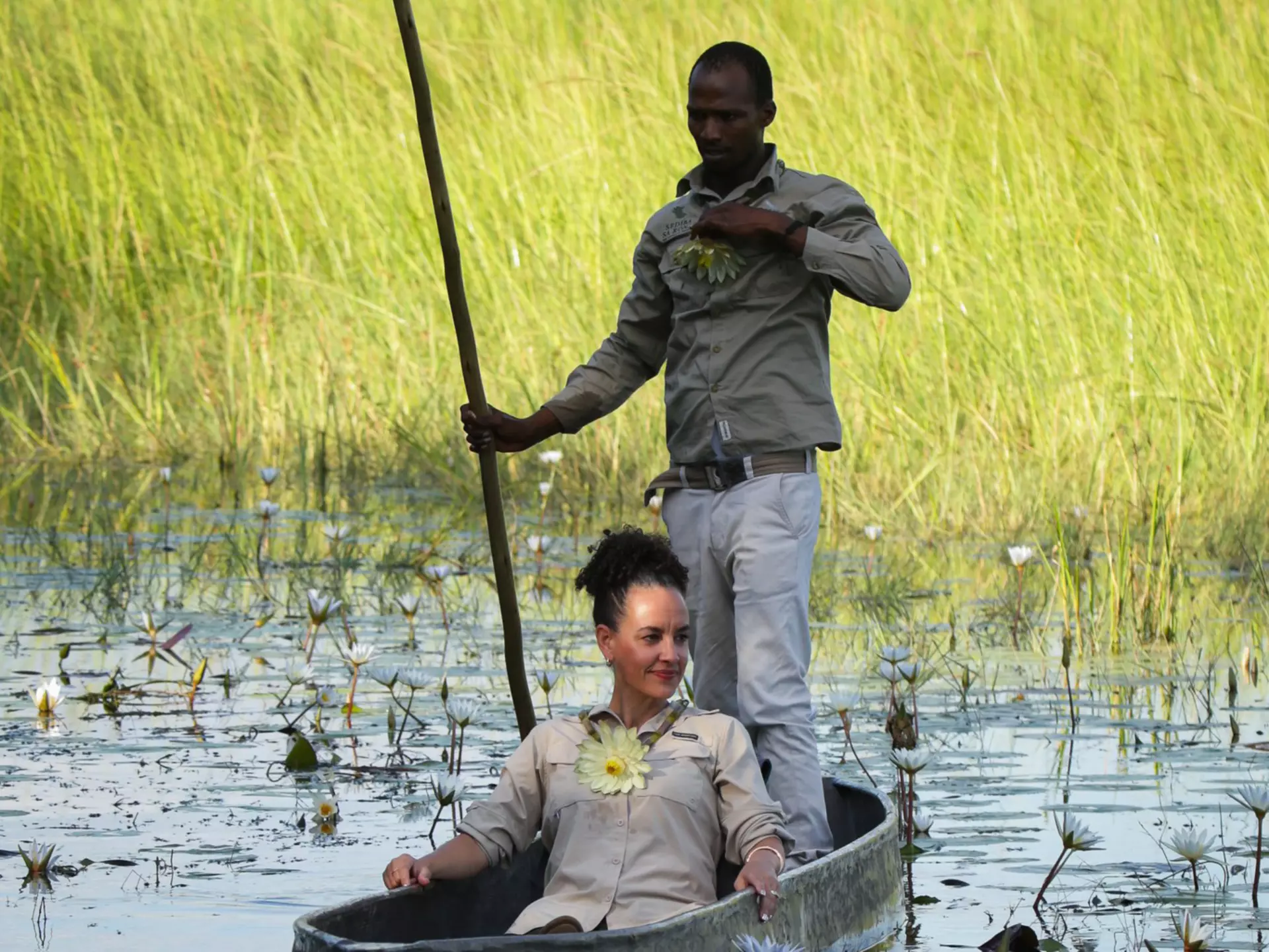 A woman sits in a mokoro in Botswana. 
