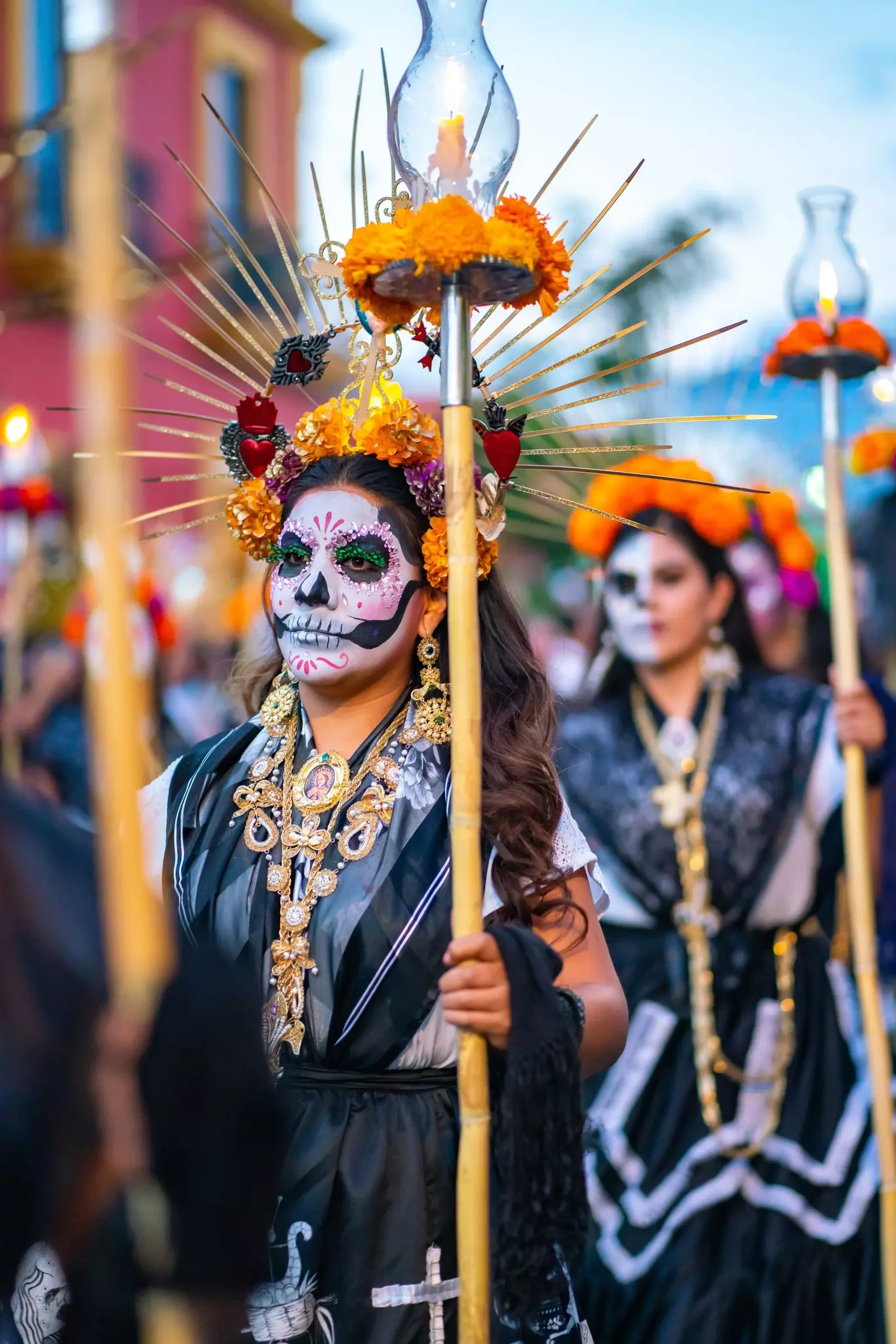 Dancers with Mexico Catrina makeup in the parade before Day of the Dead