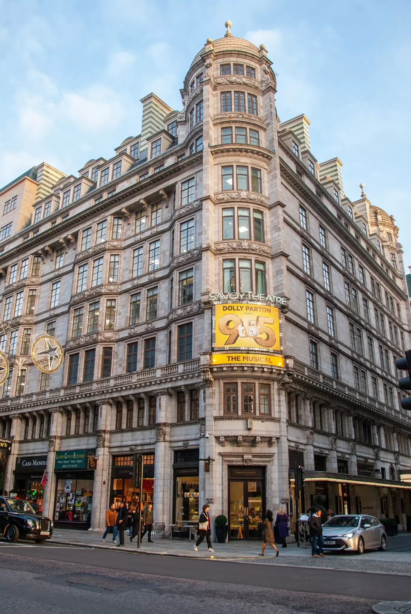 London, UK - November 5, 2019 - The corner view West End Savoy Theater, with 'Dolly Parton 9 to 5 Musical' Billboard on the facade  in the Strand in the City of Westminster, London, England, License Type: media, Download Time: 2025-07-29T20:01:09.000Z, User: katelyn.perry_lonelyplanet, Editorial: true, purchase_order: 65050 - Digital Destinations and Articles, job: wip, client: wip, other: Katelyn Perry