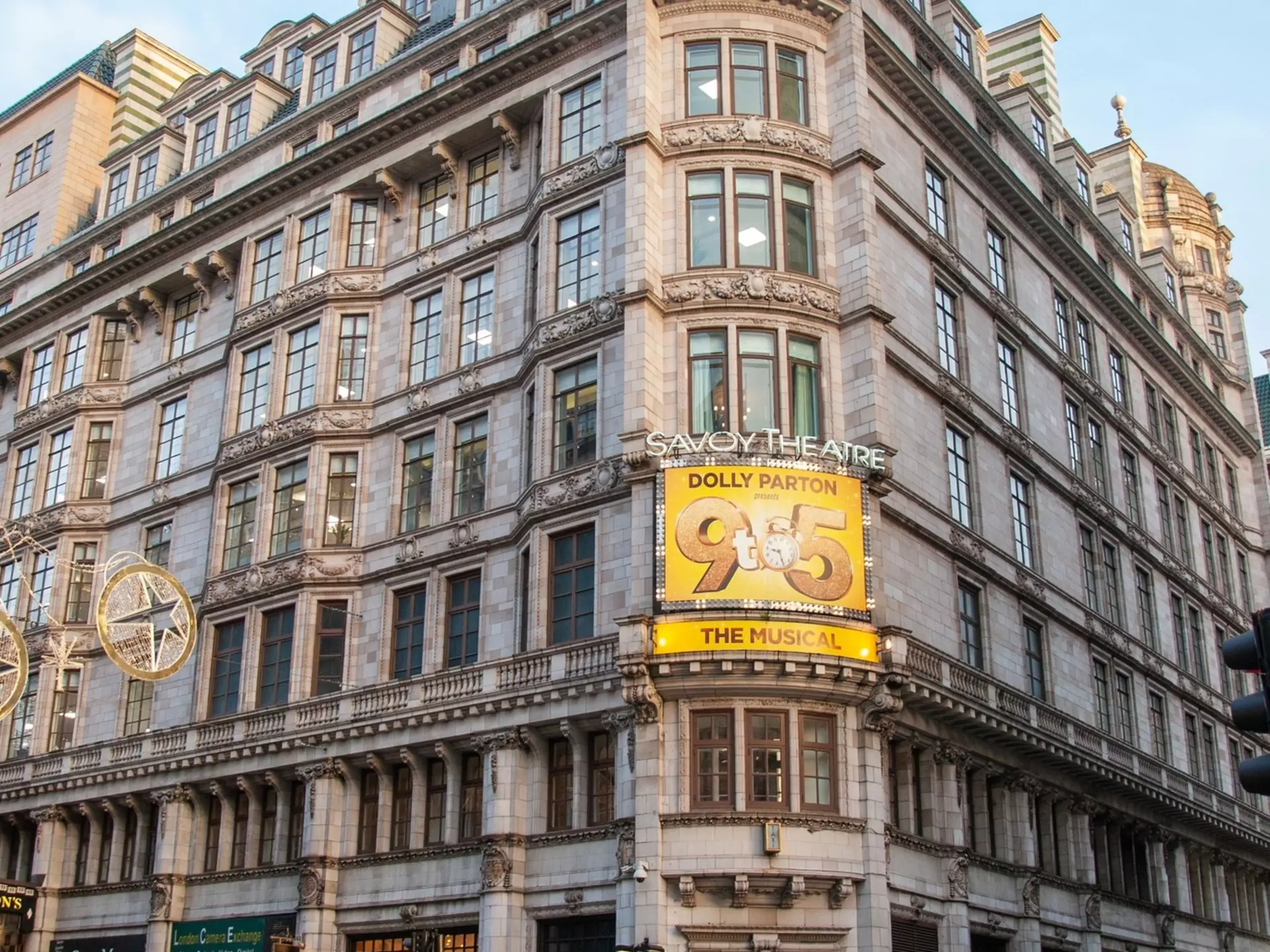 London, UK - November 5, 2019 - The corner view West End Savoy Theater, with 'Dolly Parton 9 to 5 Musical' Billboard on the facade  in the Strand in the City of Westminster, London, England, License Type: media, Download Time: 2025-07-29T20:01:09.000Z, User: katelyn.perry_lonelyplanet, Editorial: true, purchase_order: 65050 - Digital Destinations and Articles, job: wip, client: wip, other: Katelyn Perry