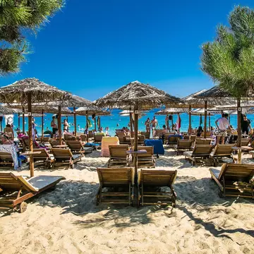 Skiathos, Greece- Avg 10, 2019. People are on vacation at  Koukounaries beach,  Skiathos Island , Greece.; Shutterstock ID 2118799838; your: Barbara Di Castro; gl: 65050; netsuite: digital; full: poi