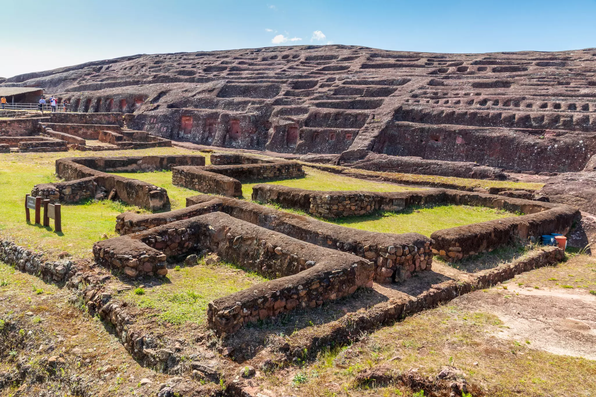 Ancient stone walls and tiers at an archaeological site.