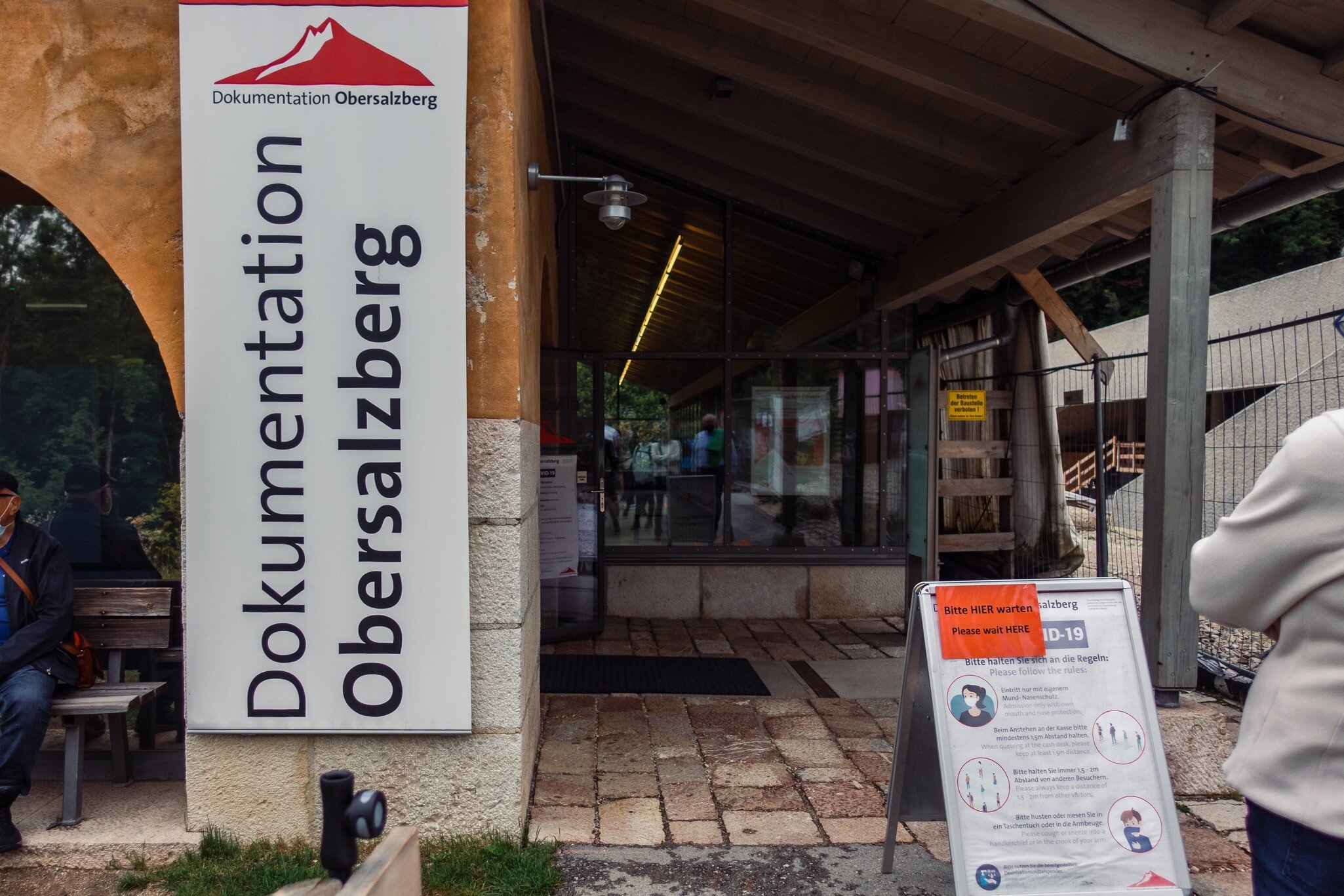 Visitors wait outside the Dokumentation Obersalzberg.