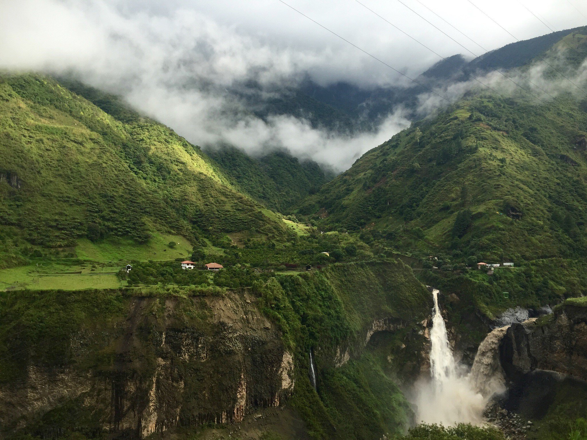 A waterfall amongst mountains in Banos de Agua Santa, Ecuador.