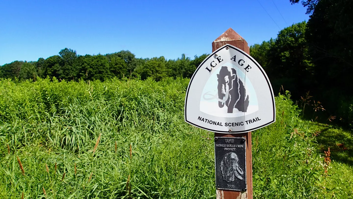 Ice Age Trail marker showing the National Scenic Trail route