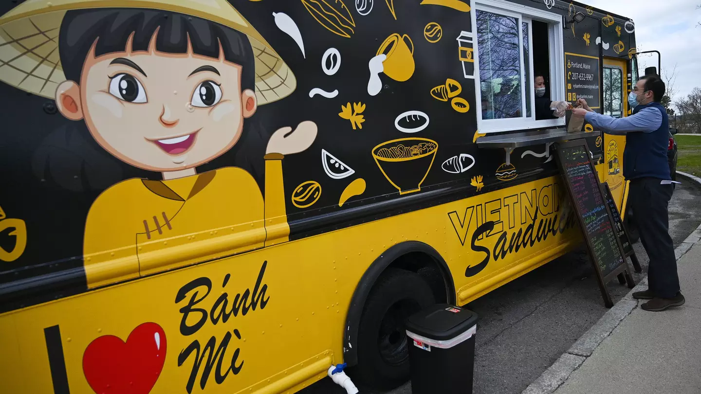 Staff serving customers wearing beekeeper suits at Mr Fogg's House of Botanicals in London