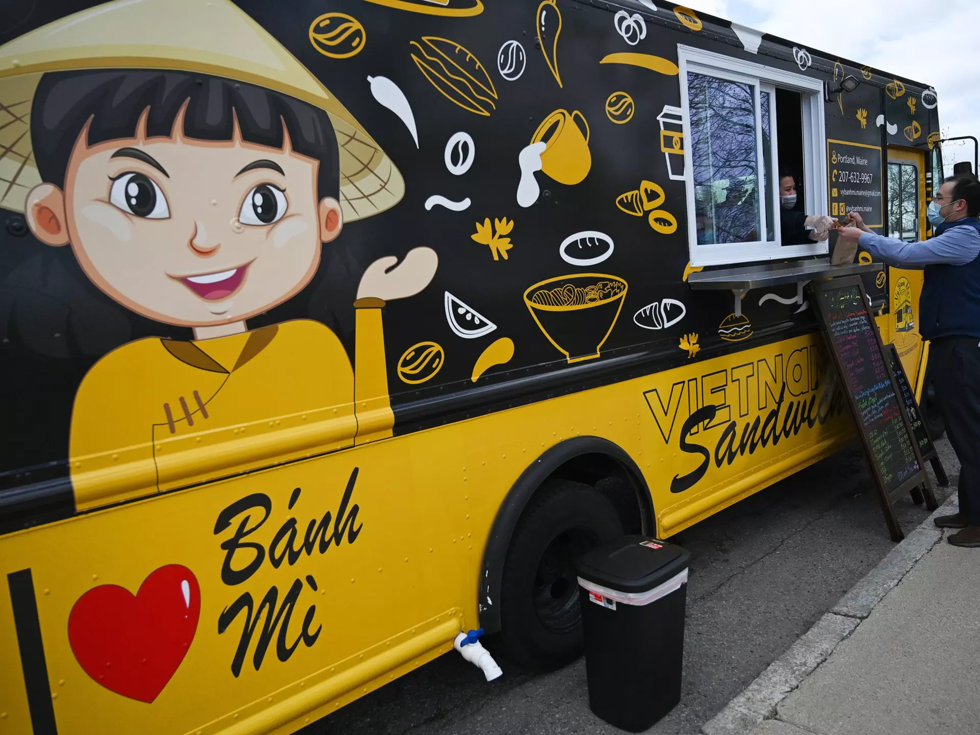 Staff serving customers wearing beekeeper suits at Mr Fogg's House of Botanicals in London