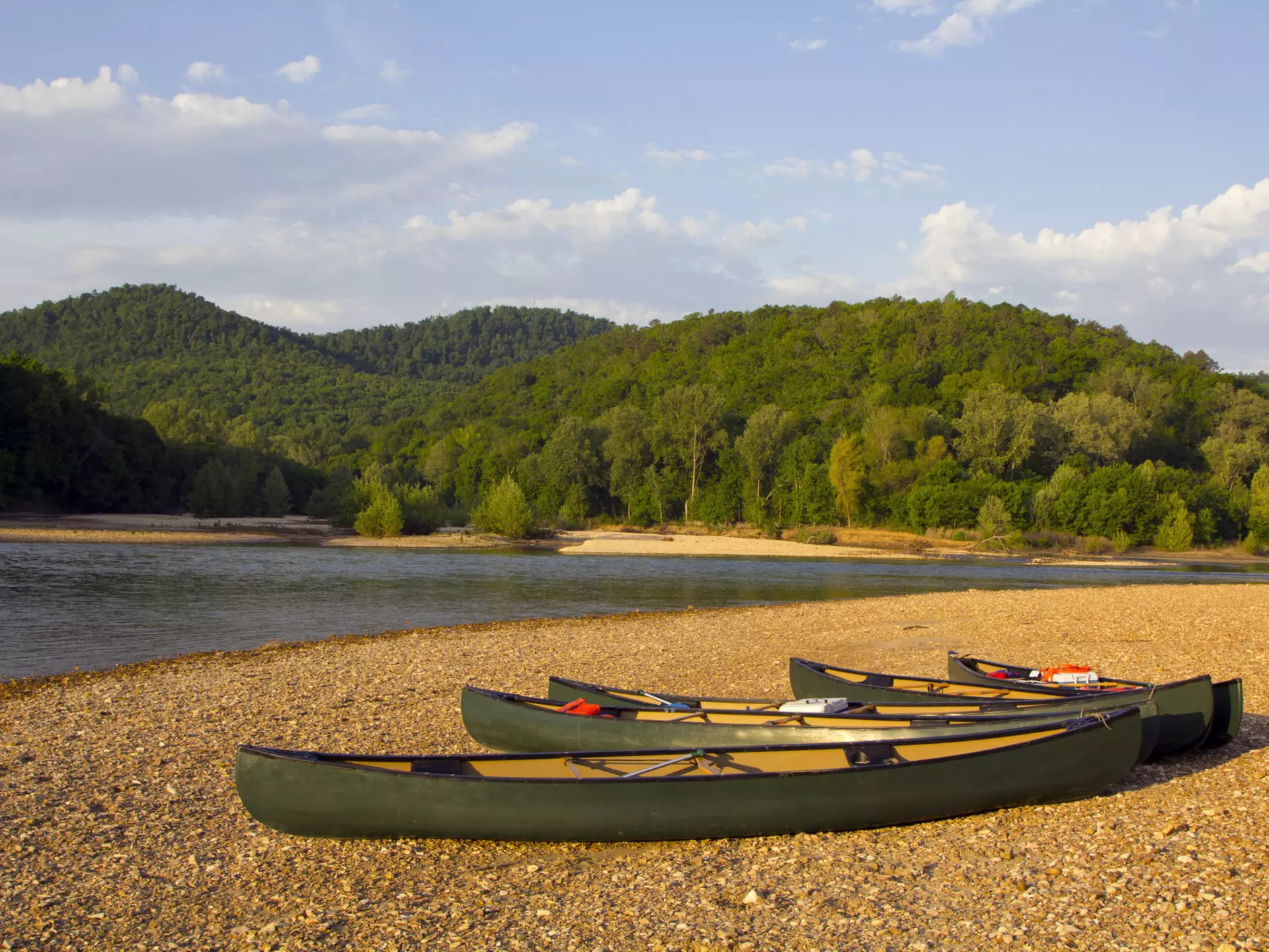Canoes on the bank of the Buffalo River, Arkansas, License Type: media, Download Time: 2025-02-10T17:23:54.000Z, User: rhylton_redventures, Editorial: false, purchase_order: 56530 - Guidebooks, job: Lonely Planet WIP, client: Lonely Planet WIP, other: Rhianydd Hylton
