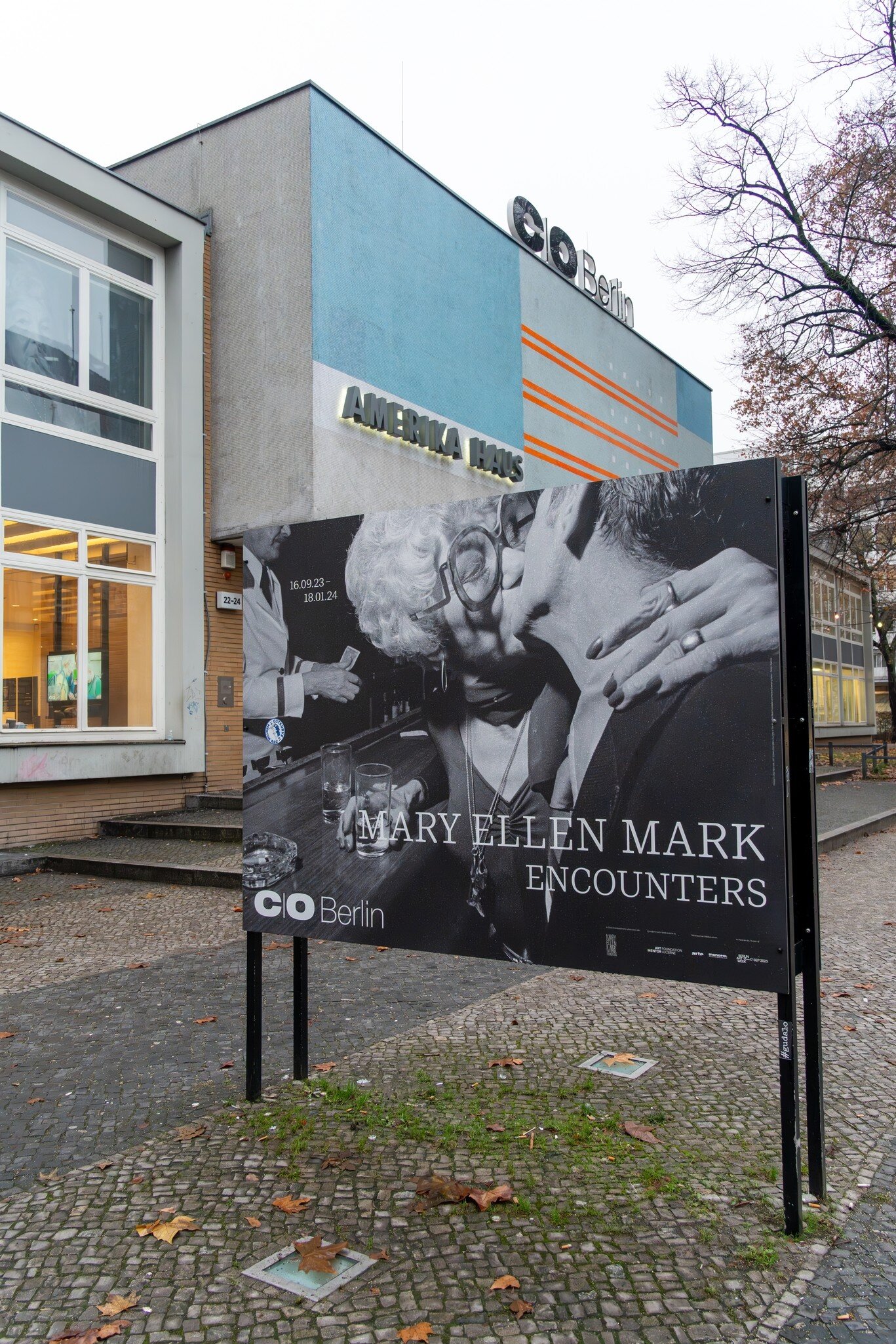 C O Berlin photography gallery at Amerika Haus (America House) with a billboard in front for Mary Ellen Mark Encounters exhibition in Berlin, Germany.