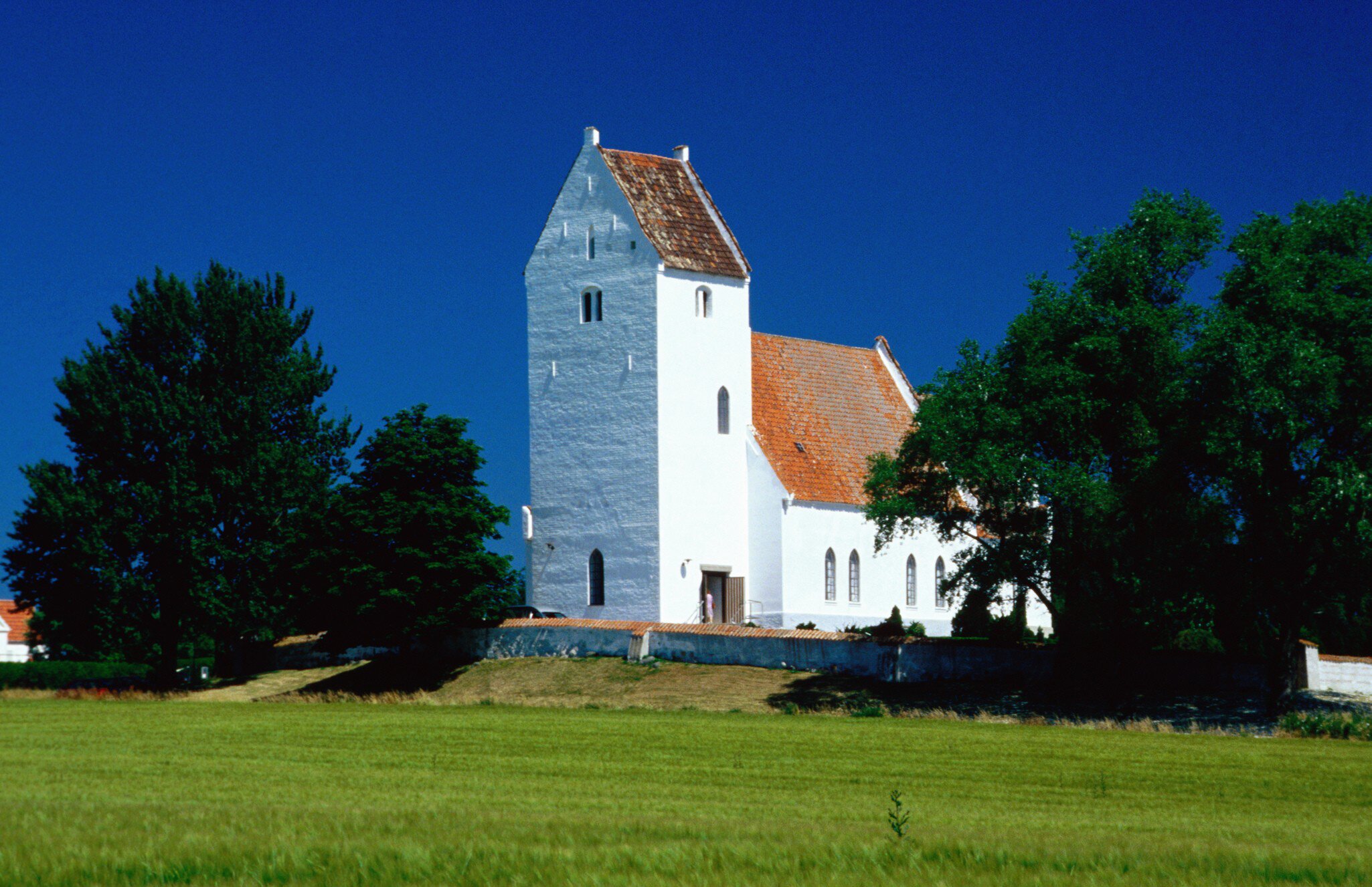 Elmelunde Kirke (church) and trees, Denmark.