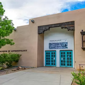 The teal entrance doors at the Maxwell Museum of Anthropology at the University of New Mexico
