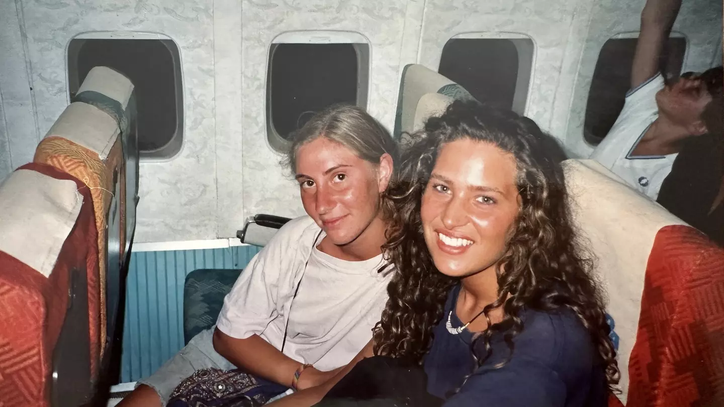 Caroline and a friend on a train in Greece.