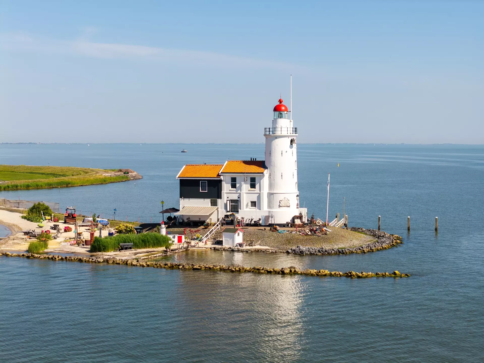 Aerial View of Marken Lighthouse (“Paard van Marken”) on IJsselmeer Coast, License Type: media, Download Time: 2025-12-12T11:40:23.000Z, User: pinkjozie64, Editorial: false, purchase_order: 65020 - Marketing or Sales - this includes sponsored articles, job: Global Publishing WIP (for books) , client: Amsterdam 14, other: Jo-anne Riddell