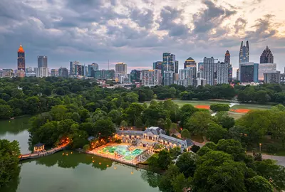 Atlanta, Georgia, USA overlooking Piedmont Park at dusk.