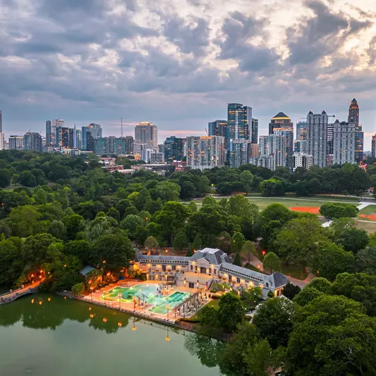 Atlanta, Georgia, USA overlooking Piedmont Park at dusk.
