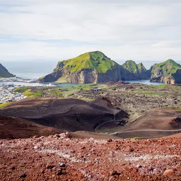 Panoramic view over the city and islands from the top of Mt. Eldfell at Westman islands, South Iceland, Europe.  License Type: media  Download Time: 2023-08-01T15:17:30.000Z  User: FergalCo  Is Editorial: No  purchase_order:   
