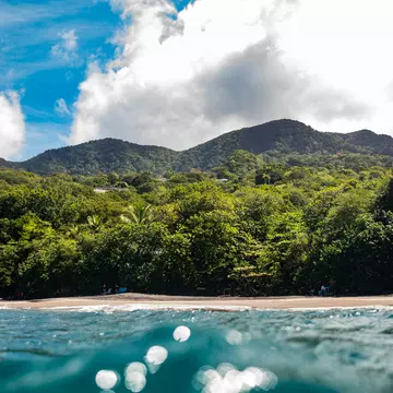 View from water of Woodland’s Beach — a popular snorkel spot on Montserrat.